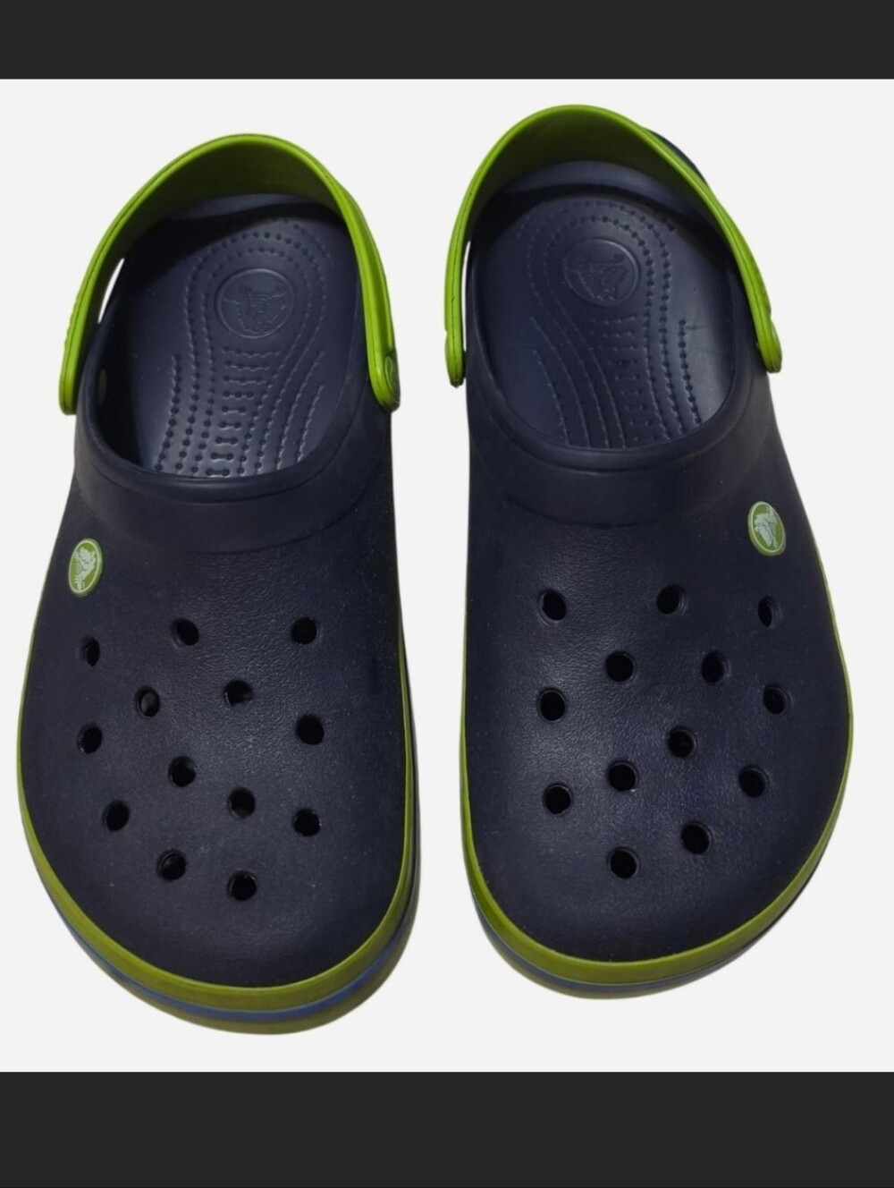 Crocs Crocband Clogs in the Navy Blue/Volt Lime Green colorway